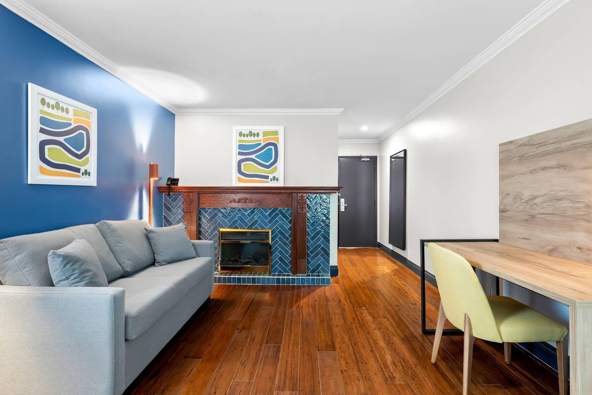 Suite, 1 King Bed, Non Smoking | Premium bedding, down comforters, blackout drapes, iron/ironing board