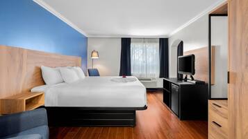 Suite, 1 King Bed, Non Smoking | Premium bedding, down comforters, blackout drapes, iron/ironing board