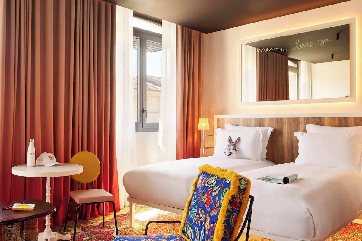 Down comforters, pillowtop beds, minibar, in-room safe