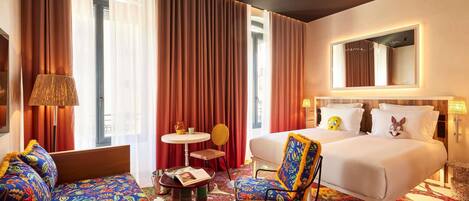 Down comforters, pillowtop beds, minibar, in-room safe