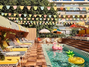 Outdoor pool, open 9:00 AM to 9:00 PM, free cabanas, pool umbrellas