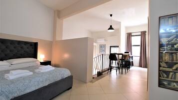 City Apartment | Desk, blackout drapes, soundproofing, iron/ironing board