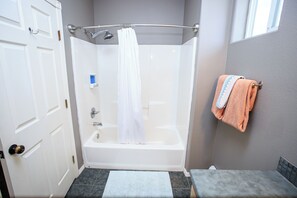 Shower, eco-friendly toiletries, hair dryer, towels