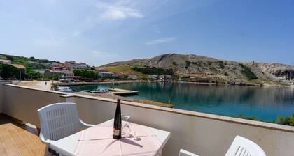 Apartment right on the harbor with slipway and boat mooring