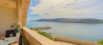 Apartment directly at the beach, shared terrace on the beach with grill