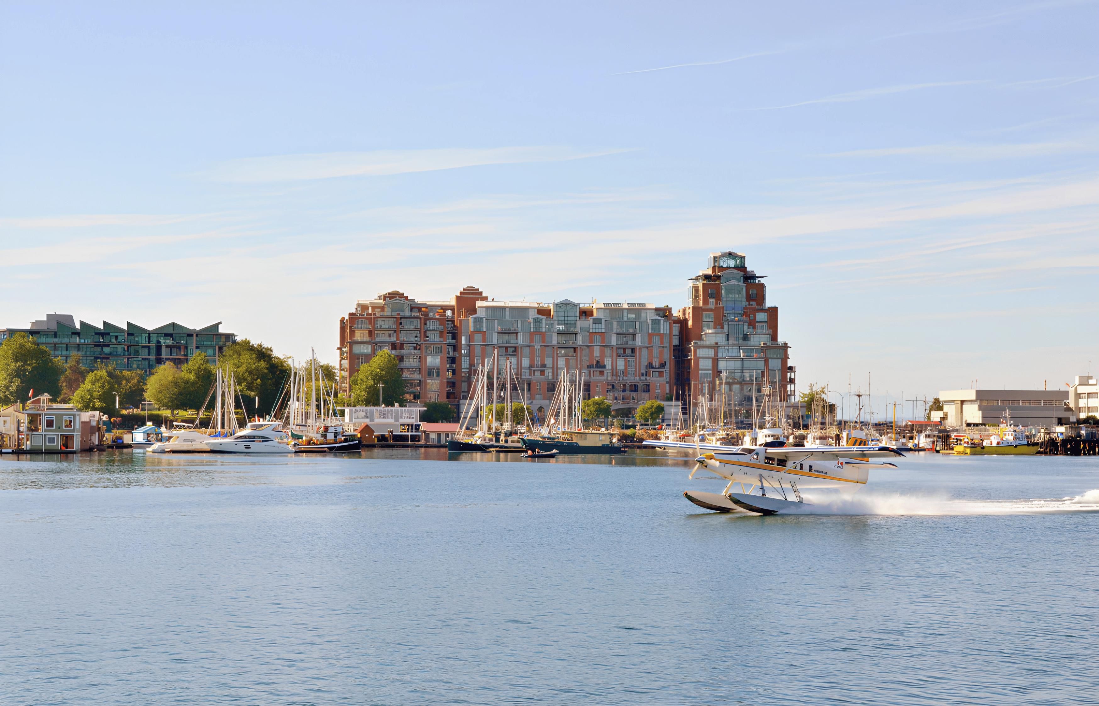 Panoramic views of downtown Victoria's harbor skyline across the water from your neighborhood path.