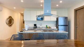 Fridge, microwave, stovetop, coffee/tea maker