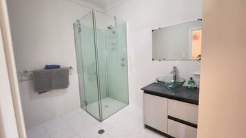 Shower, towels, soap, shampoo