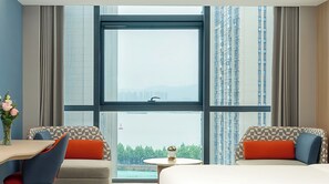 Premium bedding, down comforters, minibar, desk