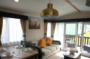 Ferienhütte | Wohnbereich | Kamin
