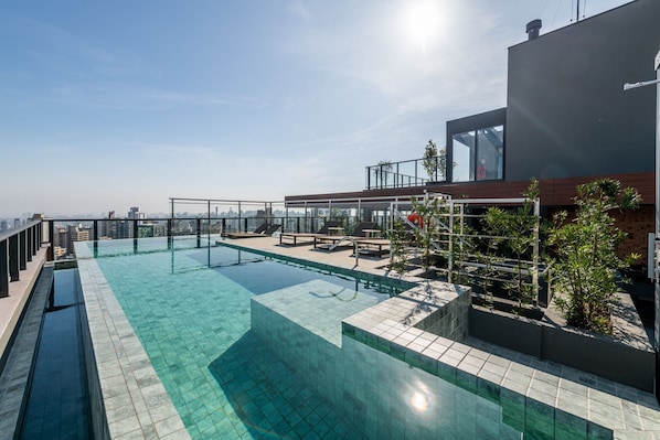Studio | Pool | Outdoor pool - LIV by LEMMON HOMES (Porto Alegre)