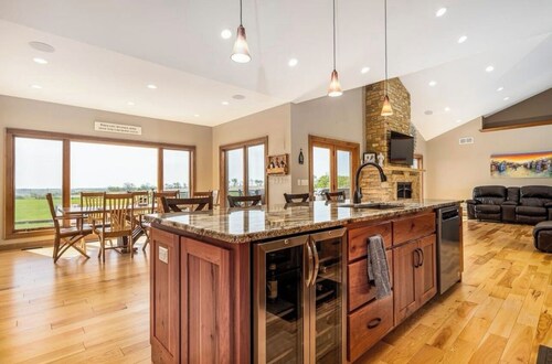 Less than one mile from the ATV Trail with a hot tub on deck to end your day!