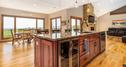 Less than one mile from the ATV Trail with a hot tub on deck to end your day!