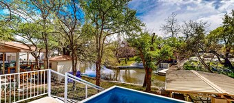 Waterfront home with game room, decks, pool, smart TVs, kayaks, & gas grill