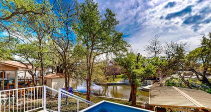 Waterfront home with game room, decks, pool, smart TVs, kayaks, & gas grill