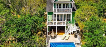 Waterfront home with game room, decks, pool, smart TVs, kayaks, & gas grill