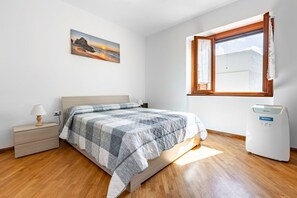 2 dormitorios, tabla de planchar con plancha, wifi y ropa de cama