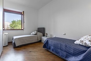 2 dormitorios, tabla de planchar con plancha, wifi y ropa de cama