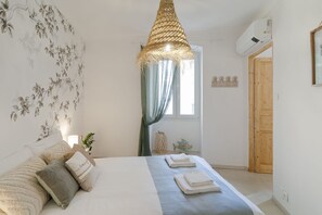 2 habitaciones, tabla de planchar con plancha, wifi y ropa de cama 