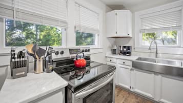 Microwave, stovetop, toaster, cookware/dishes/utensils
