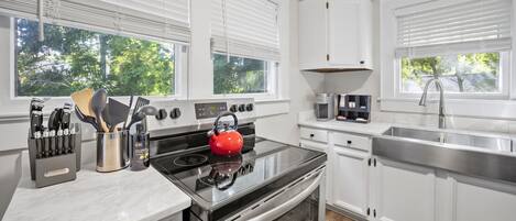 Microwave, stovetop, toaster, cookware/dishes/utensils