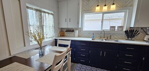 Fridge, microwave, oven, stovetop - Cozy Up North Retreat in the Heart of Sault Ste. Marie. Pet Friendly! Hot Tub! (Sault Ste. Marie)