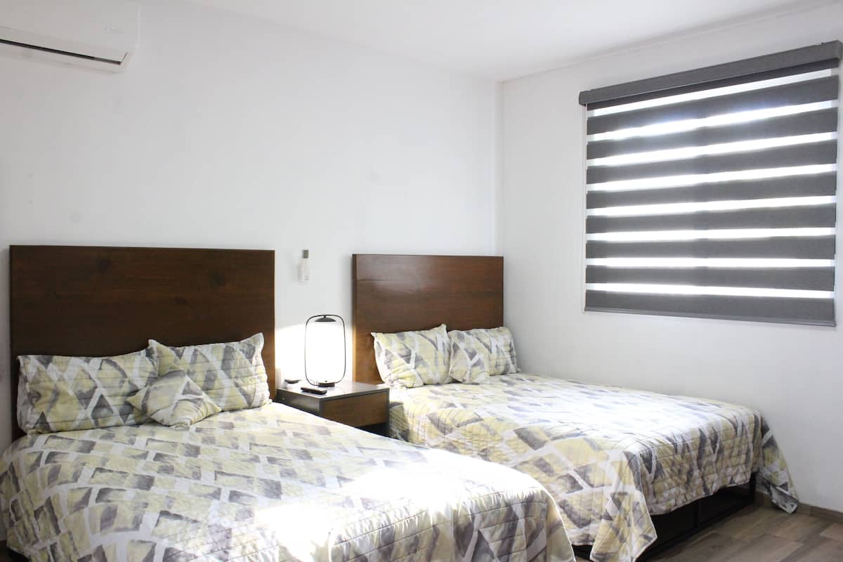 Superior Double Room, Garden View | Blackout drapes, iron/ironing board, WiFi (free), bed sheets