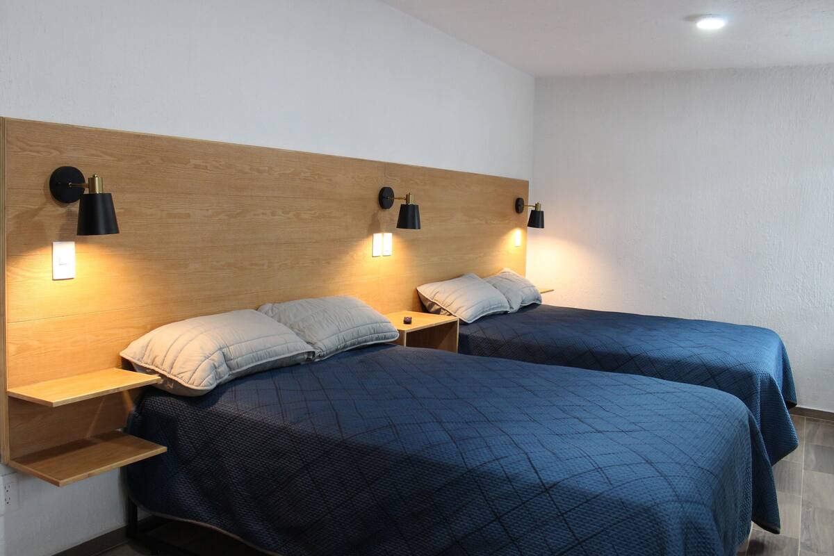 Family Apartment, Courtyard View | Blackout drapes, iron/ironing board, WiFi (free), bed sheets