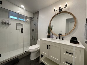 Shower, hair dryer, towels, soap