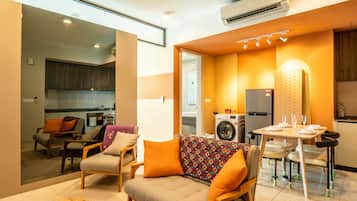 Apartamento Deluxe | Zona de estar