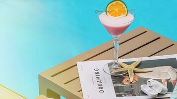 Indoor pool, open 6:30 AM to 8:00 PM, pool umbrellas, pool loungers
