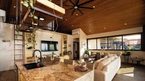 A modern kitchen with a marble countertop, wooden ceiling, and a large window.