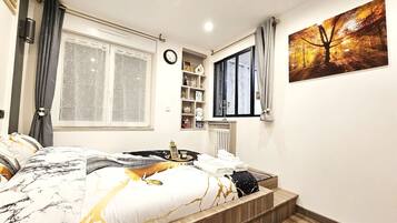 1 chambre, fer et planche Ă repasser, Wi-Fi, draps fournis