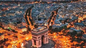 An aerial view of a cityscape with a prominent monument at the center, surrounded by dense urban buildings and busy streets. - Apartment - Sleeps 4 - Balcony - Near Metro Stn (Le Kremlin Bicetre)