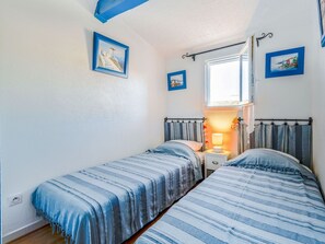 2 quartos, berço de viagem, Wi-Fi (sobretaxa), roupa de cama