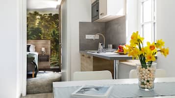 Fridge, microwave, cookware/dishes/utensils