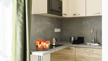 Fridge, microwave, cookware/dishes/utensils