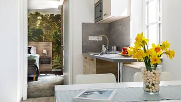 Fridge, microwave, highchair, cookware/dishes/utensils