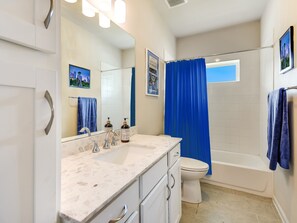 Hair dryer, towels, soap, toilet paper