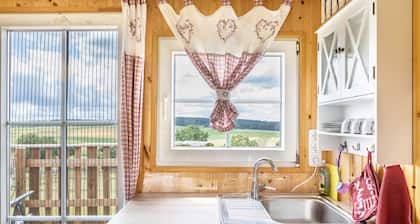 Ferienhaus 'Tinyhouse Alpakawiese' mit privater Terrasse und Gemeinschaftsgarten