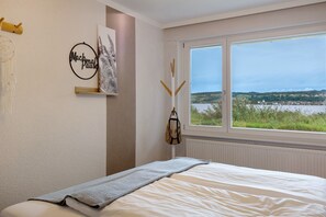 1 habitación, tabla de planchar con plancha, wifi gratis y ropa de cama 