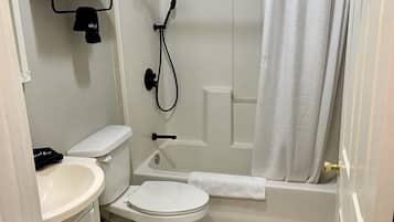 Hair dryer, towels, soap, shampoo
