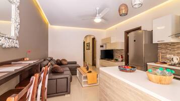 Family Apartment, Multiple Bedrooms (Maisonnette & Pool Ta'Cenc Sannat) | Living area | 21-inch TV with digital channels