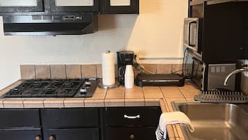 Fridge, microwave, coffee/tea maker, toaster