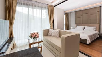 Apartemen Comfort, pemandangan laut terbatas | 1 kamar tidur, brankas, tirai kedap cahaya, dan kedap suara