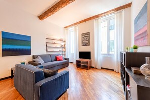 Family Apartment, Multiple Bedrooms (Charming Flat Next To Genoa's) | Living area | 21-inch flat-screen TV with cable channels - Charming Flat Next To Genoa's Aquarium (Genoa)