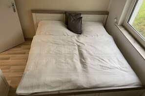 1 多间卧室、旅行婴儿床、免费 WiFi、床单