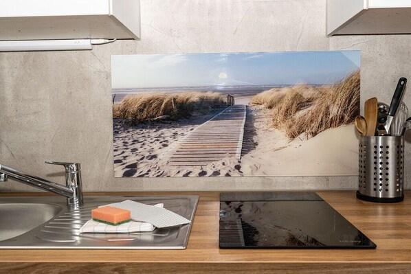 Fridge, microwave, stovetop, coffee/tea maker