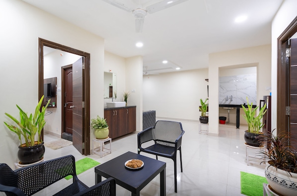 Classic Apartment | Living area | Flat-screen TV