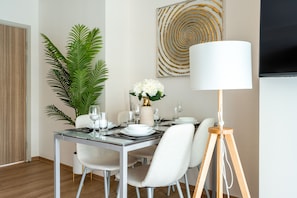 Business Apartment, Balcony, Pool View | In-room dining